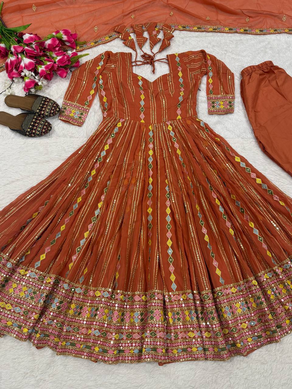 Radiant Rust Orange Flared Anarkali Suit Set Adorned with Multicolored Geometric Embroidery and Dazzling Mirror Work Detailing